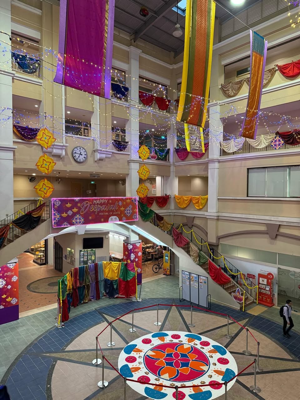 Visitors enjoying the festive Deepavali decor at Elias CC, perfect for memorable photos.